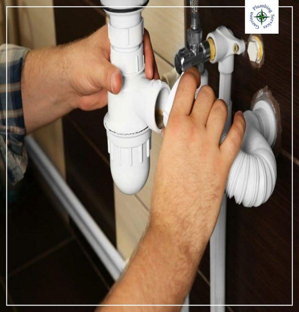 commercial plumber with pipes