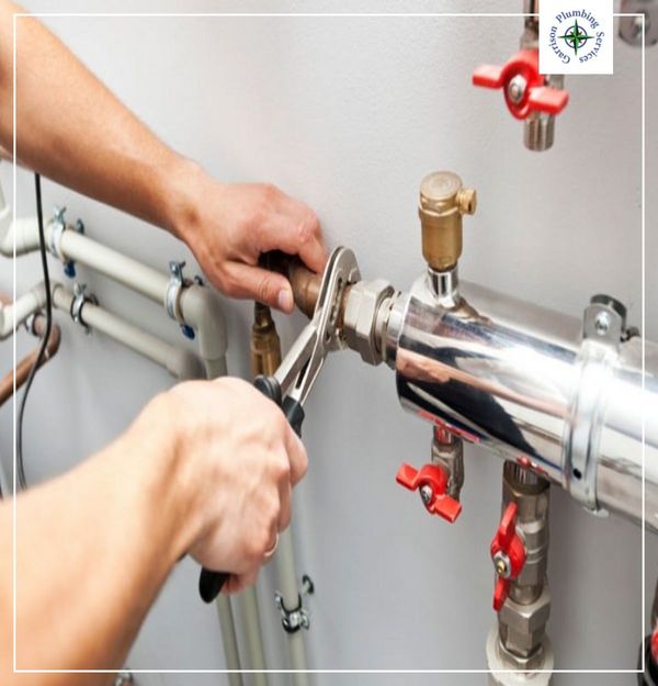 commercial plumber at work