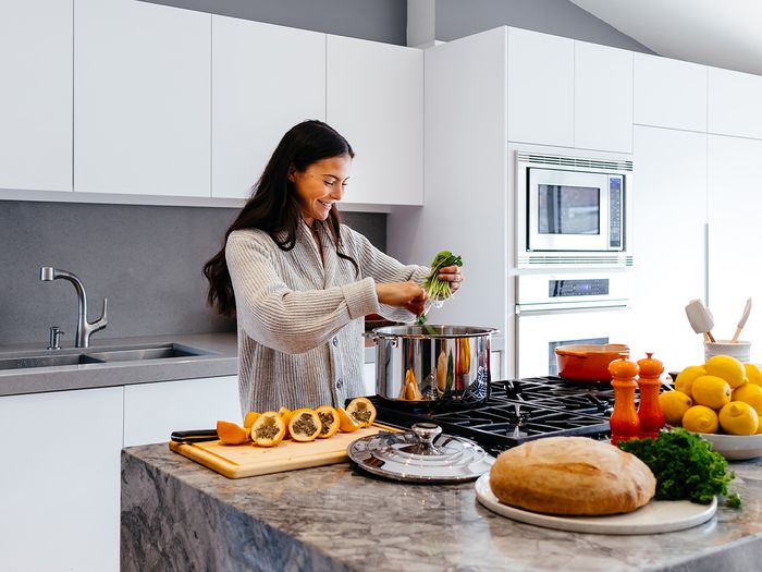 Woman cooking healthy meal