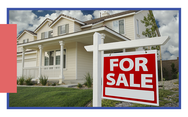 A house with a for sale sign