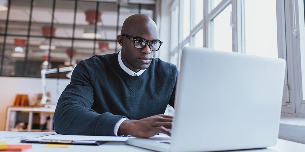 a businessman on a laptop