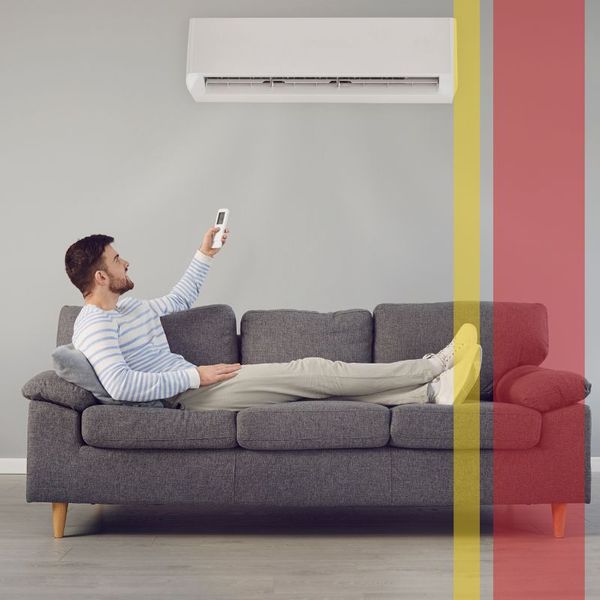 Man enjoying a newly repaired AC unit in home.