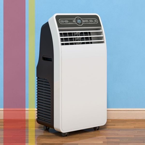 Image of a swamp cooler against a blue wall.