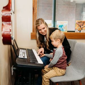 music therapy with boy and keyboard music therapy with boy and keyboard