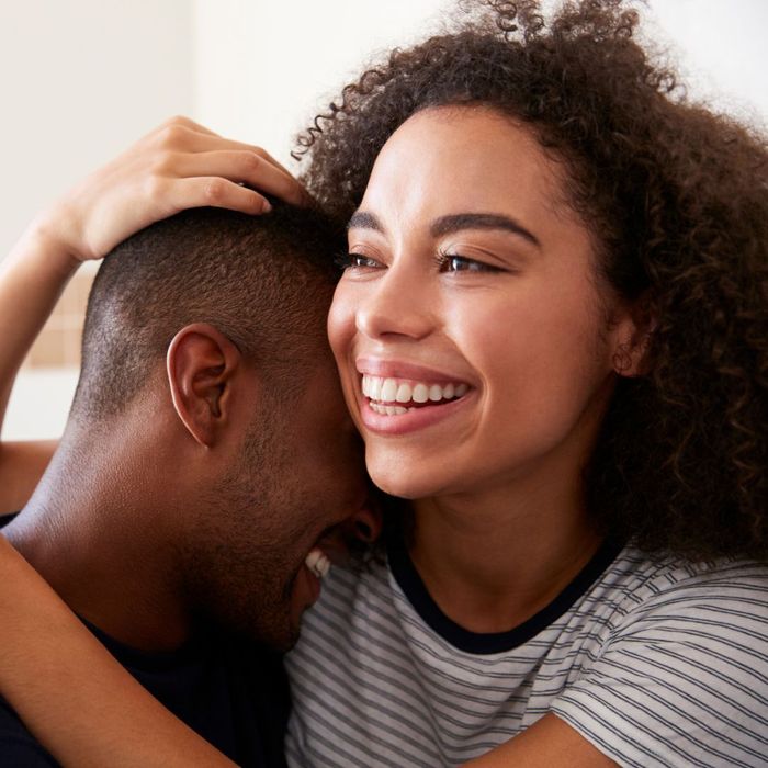 Woman hugging man 