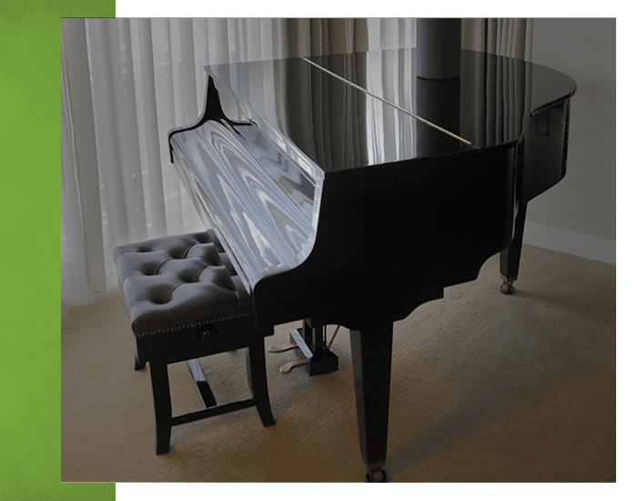 piano and bench in a room