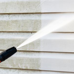 a person power washinmg siding Exterior Painting Image Icon.jpg