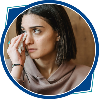 woman wiping tears