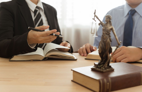 attorney discussing over open books