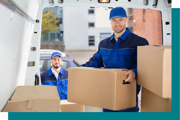 movers loading a van with boxes