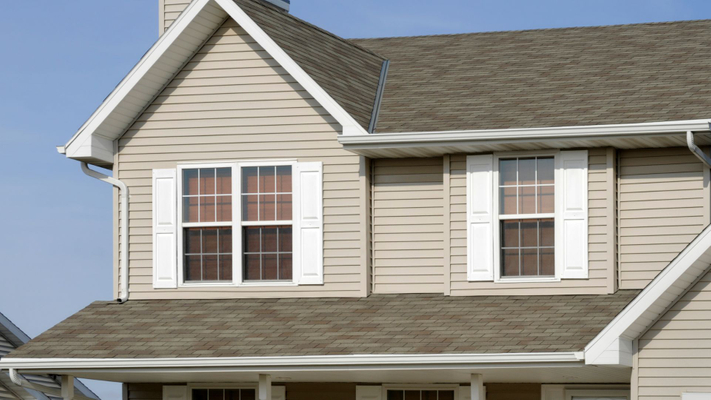 a home with white raised shutters