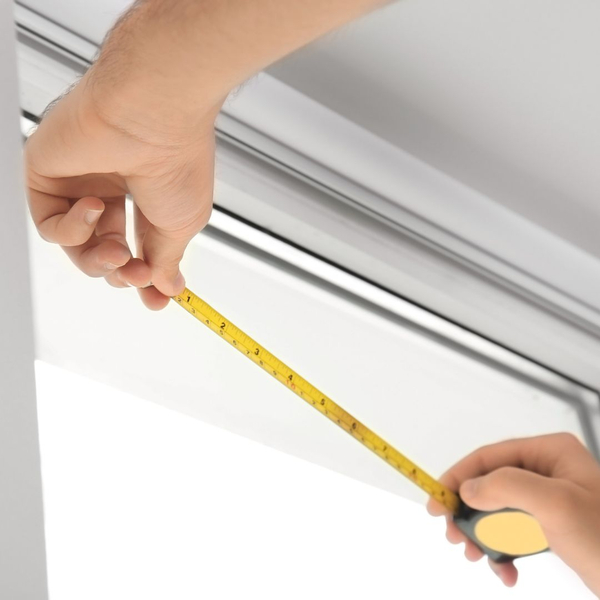 a person pulling a tape measurer Why Measurements Matter (2).jpg