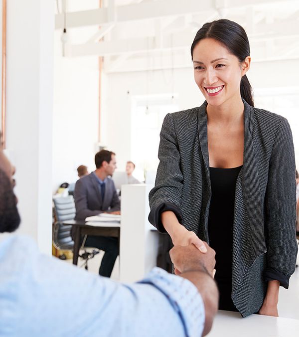 A woman meeting with a tax professional