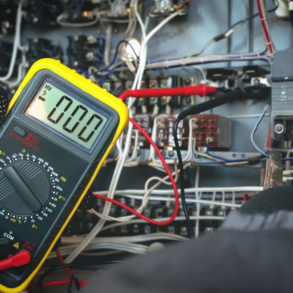 electrician measuring electrician measuring