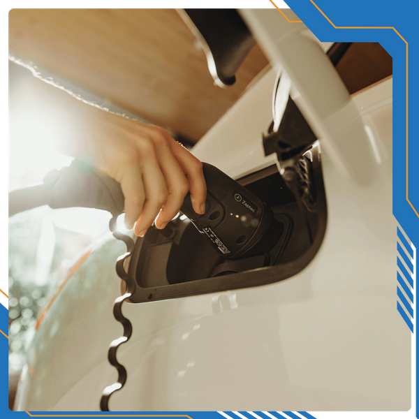 person using ev charger person using ev charger