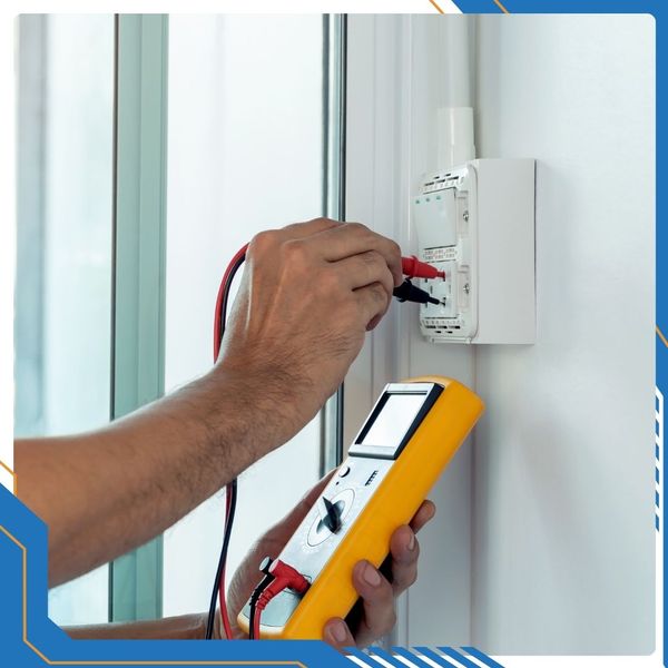 a person checking outlets Residential Services (3).jpg