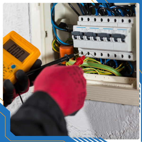 A professional residential electrician performing a safety diagnostic on a home's main electrical panel