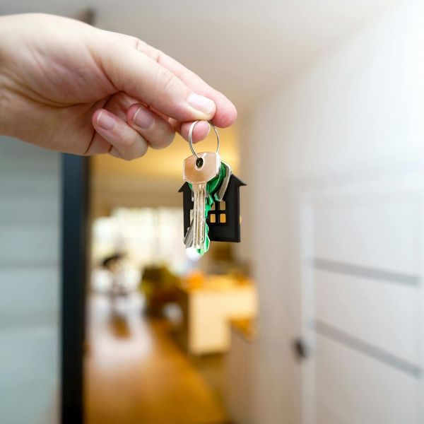 a man receiving keys to their new home after a successful electrical inspection. image44.jpg