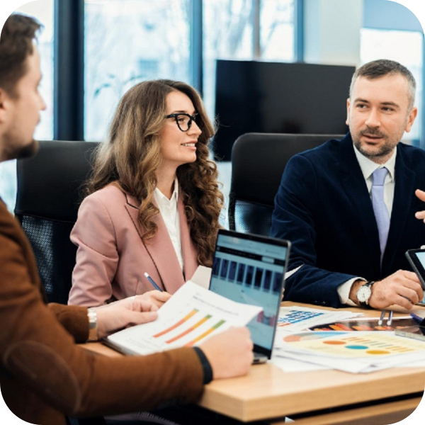 financial consultants sitting at desk talking