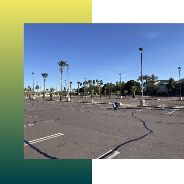 Business parking lot with lots of cracking