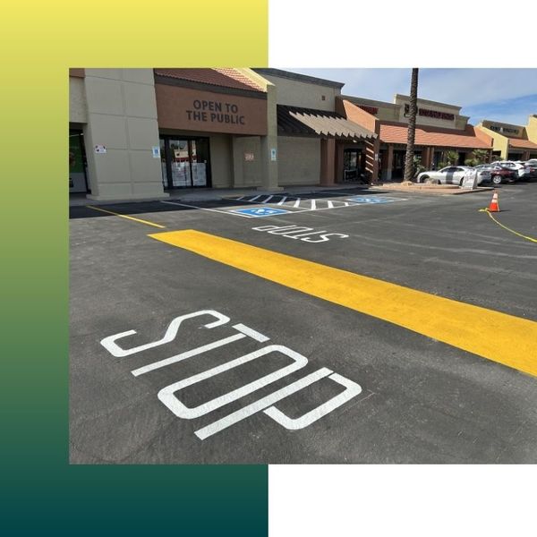 Stop painted on the ground before a speed bump in a parking lot