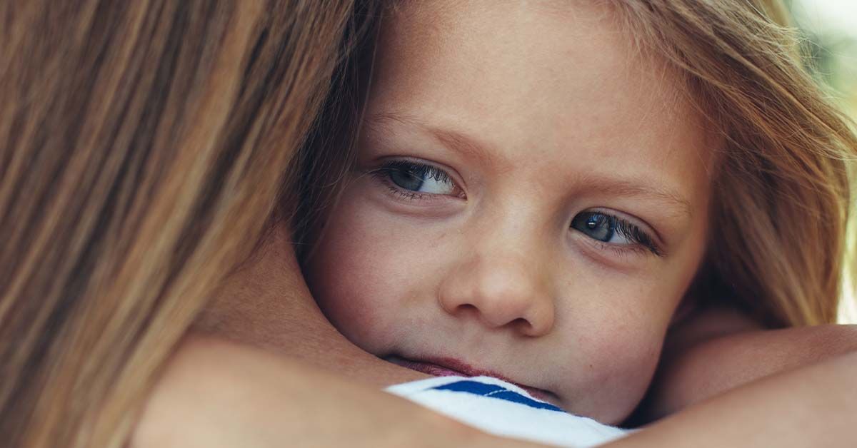 child being held