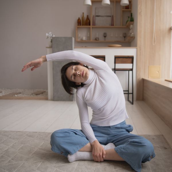 a woman doing yoga How To Get The Most Out of Chiropractic Adjustments (2).jpg