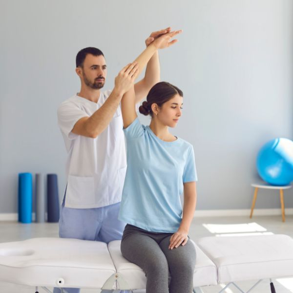 chiropractor with patient chiropractor with patient