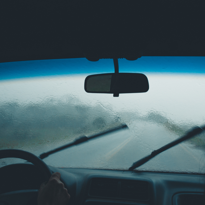 car driving through a storm. 