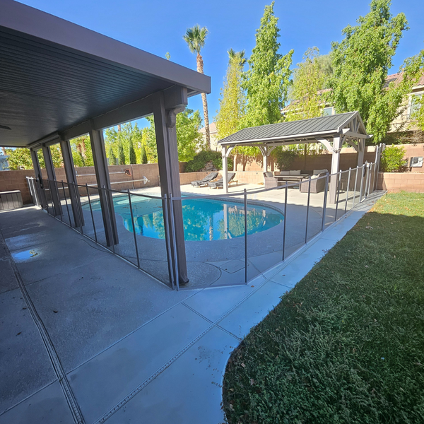 A fence around a small pool