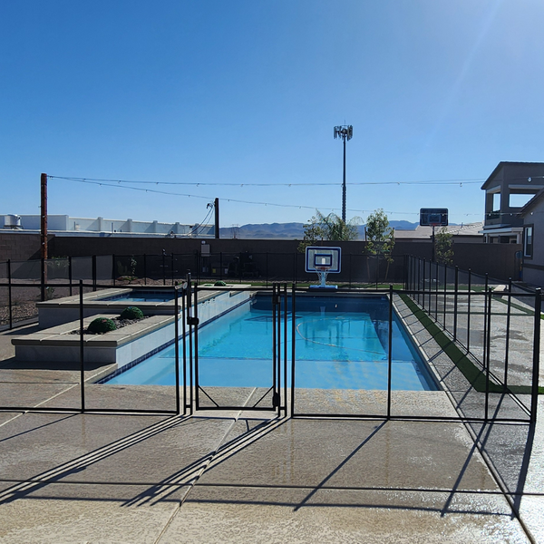 A fence around a large pool