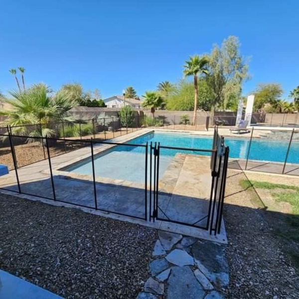 A temporary fence around a pool