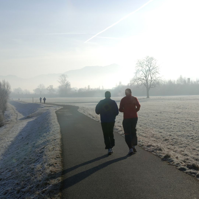 two people jogging in winter