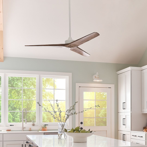 Modern wood ceiling fan in bright white kitchen interior