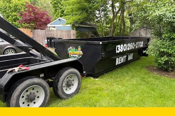 roll off dumpster rental in front of a home