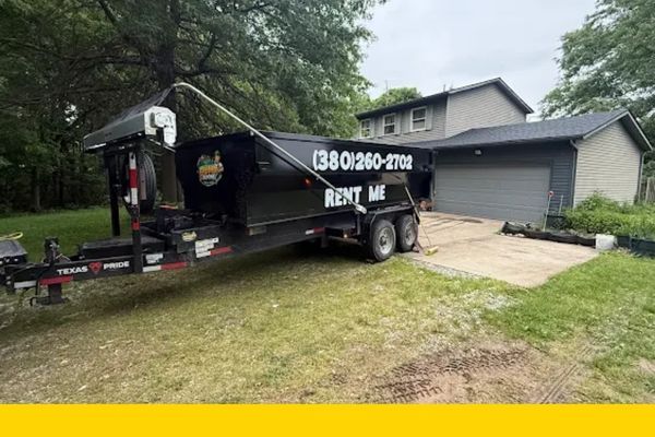 roll off dumpster rental in front of a home