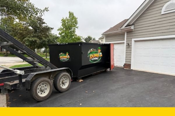 roll off dumpster rental in front of a home