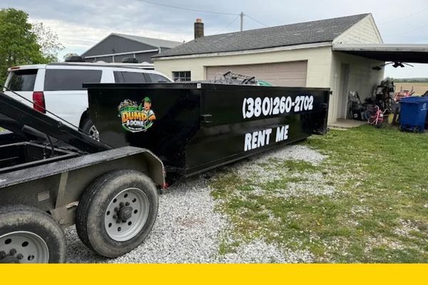 roll off dumpster rental in front of a home