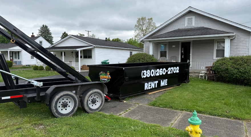 roll off dumpster in front of a home roll off dumpster in front of a home