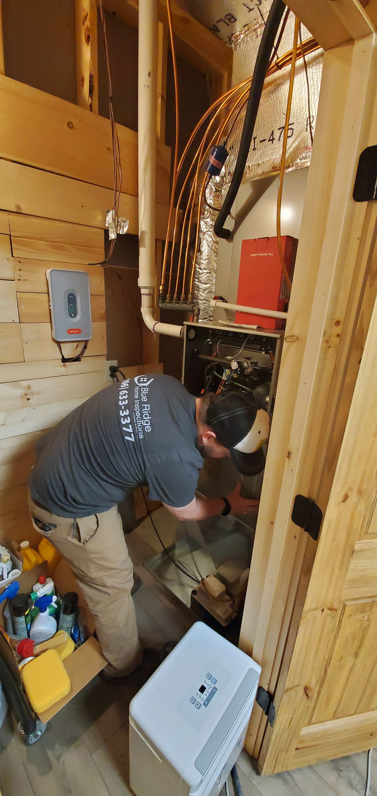 Levi inspecting the HVAC 2.jpg