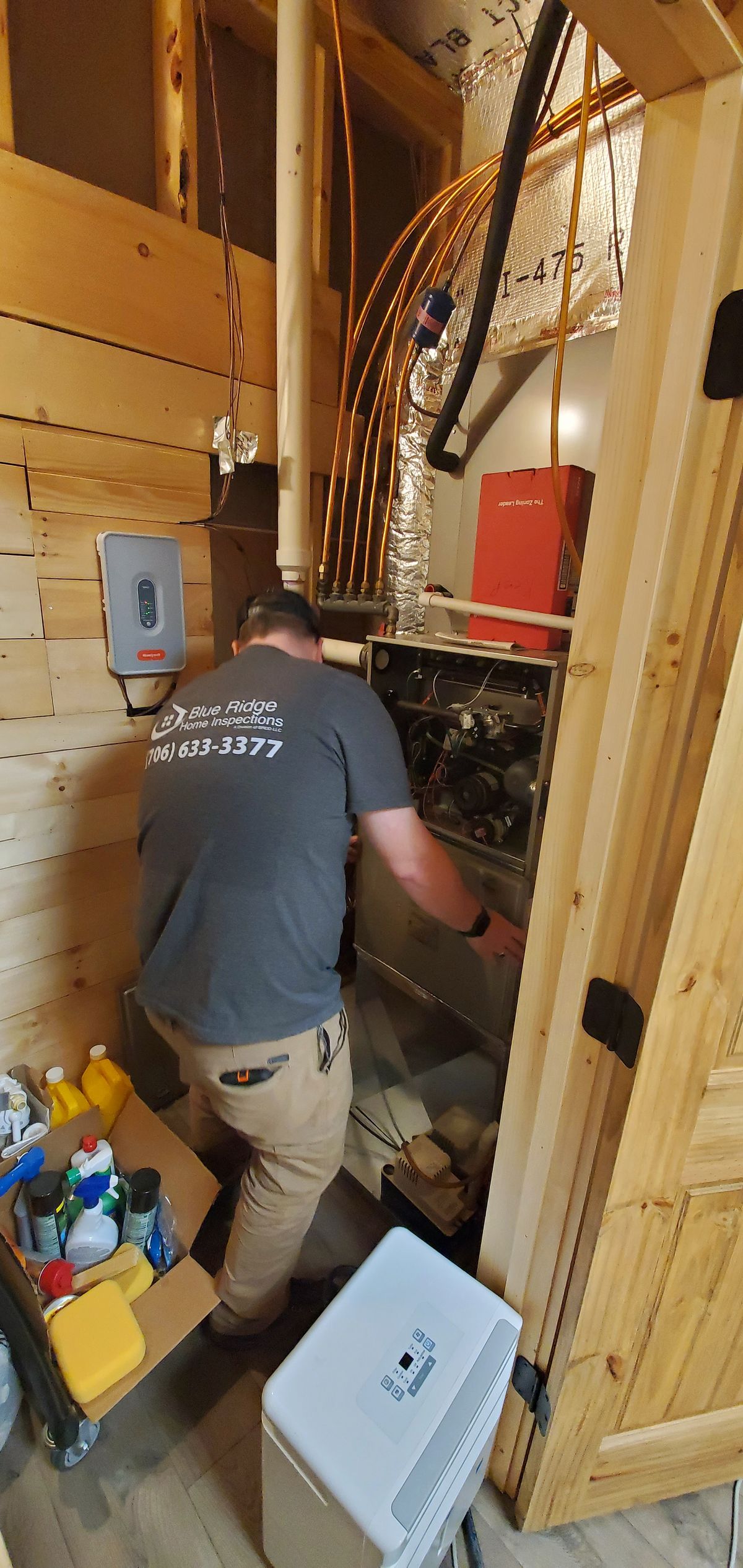 Levi inspecting the HVAC.jpg