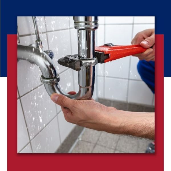 a plumber fixing a sink 5050 Images.jpg