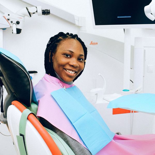 A calm patient relaxing in a dental chair. A calm patient relaxing in a dental chair.