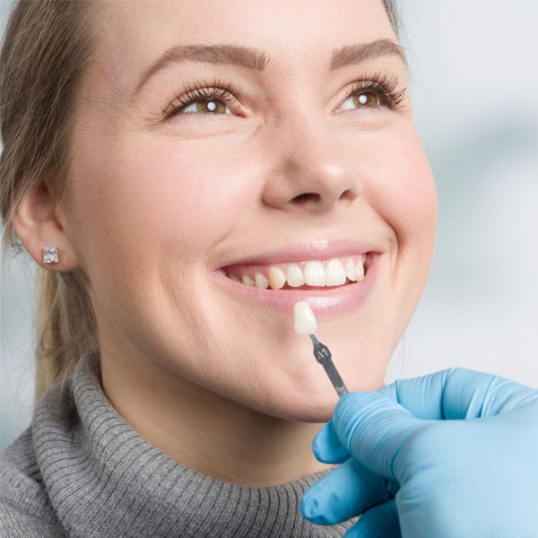 woman smiling for dentist