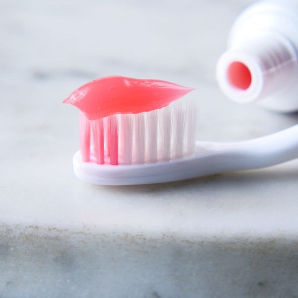 toothbrush with toothpaste on it toothbrush with toothpaste on it