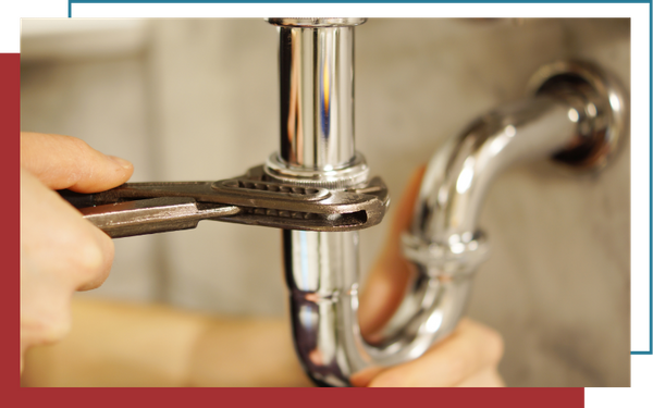 Plumbing pipe being tightened