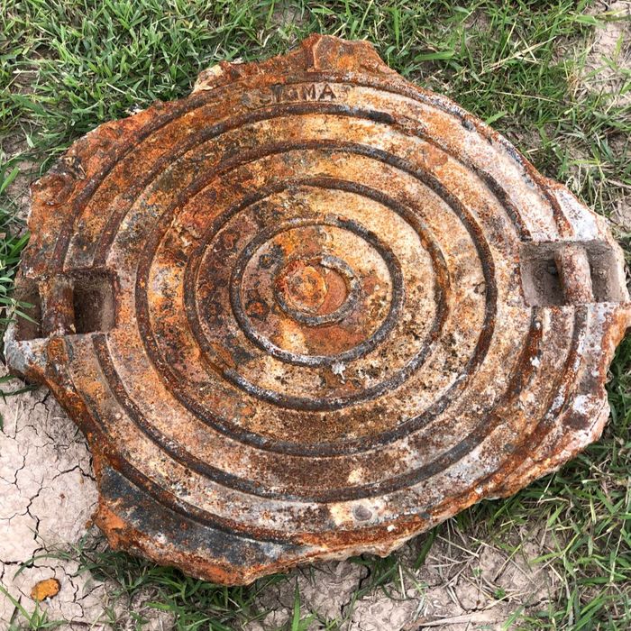 corroded manhole cover