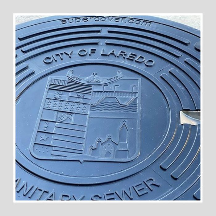 composite cover with Laredo stamped on it