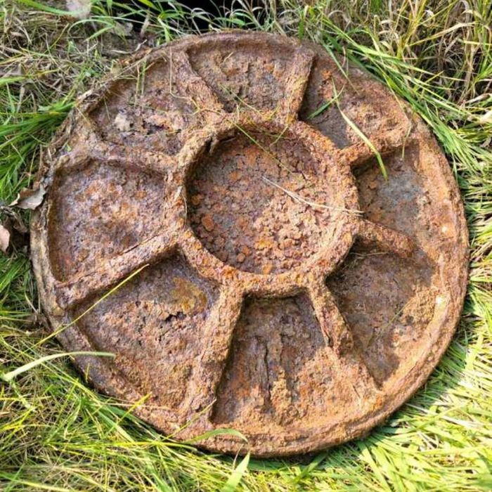 rusted manhole cover