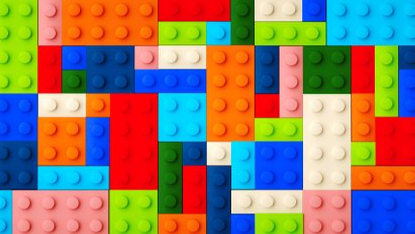 A layer of multi-colored LEGO bricks